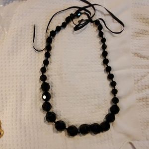 Long black beaded necklace